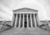 Courthouse Arrests Halted? Virginia Sparks Showdown Supreme Court building with tall columns and wide steps