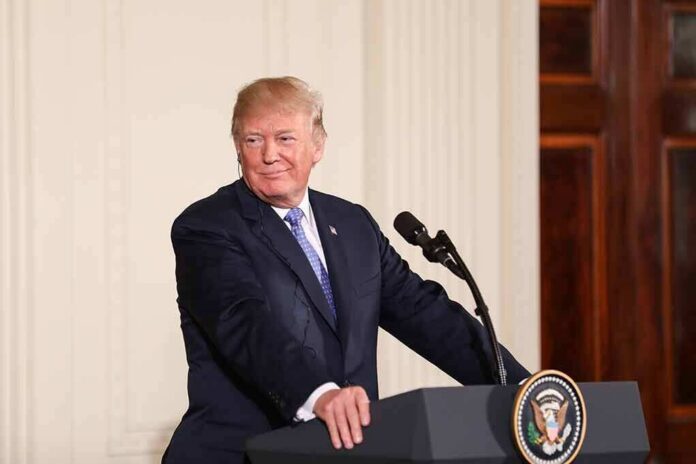 man at podium with presidential seal