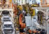 Trump Boom Talk Collides With Payroll Pain Industrial robots assemble car bodies on an automotive production line