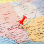 LA Feds’ Wild Hire Sparks Outrage Red pushpin on a map marking southern Nevada and nearby states