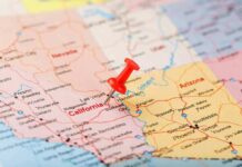 LA Feds’ Wild Hire Sparks Outrage Red pushpin on a map marking southern Nevada and nearby states