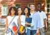 Group of students standing outside a campus building