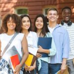 Group of students standing outside a campus building