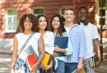 Campus Speech Bombshell Stuns CUNY Group of students standing outside a campus building