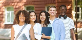 Group of students standing outside a campus building