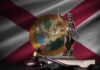 Judge Greenlights Explosive Abortion Fight Lady Justice statue with gavel and book before Florida state flag