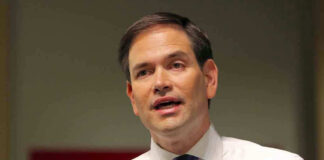 Marco Rubio speaking with a microphone