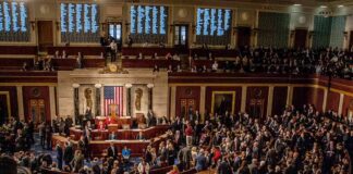 House chamber filled with lawmakers during a session