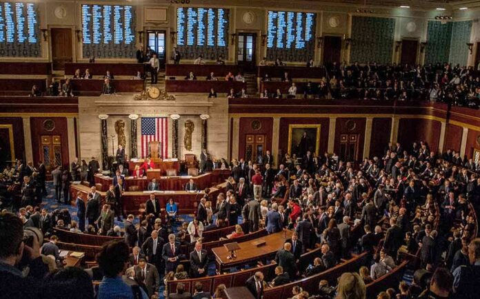 House chamber filled with lawmakers during a session