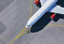 Emergency Turnover After Violent Flight Deck Clash Airplane taxiing on airport tarmac from above