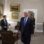 Trump – Xi Showdown: Stakes Go Nuclear Donald Trump walks through an office with Sean Lawler nearby and Mariano Rajoy following behind