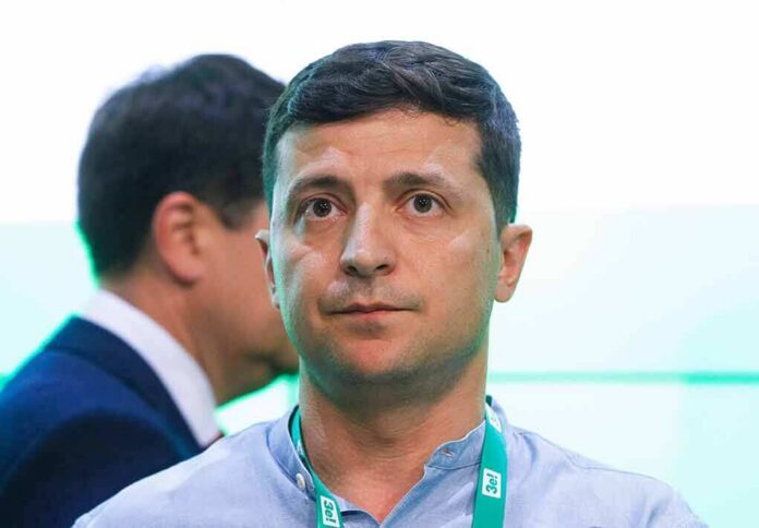 shutterstock_1468322981 man with short dark hair wearing a lanyard