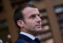 Court Smacks Ban—Macron Doubles Down man in suit looking to the side