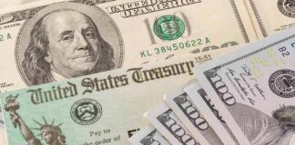 U.S. Treasury check and hundred-dollar bills