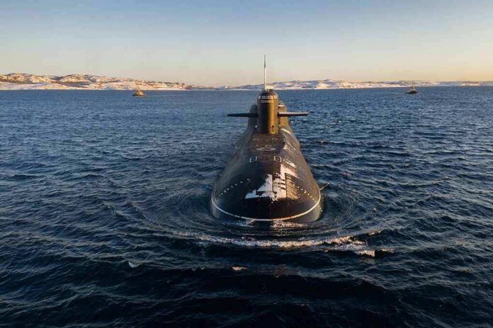 shutterstock_2008005947 Submarine cruising on cold open water toward camera