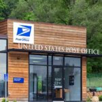 Gun Ban Whiplash Stuns Mail Lines Exterior view of a modern United States Post Office building surrounded by greenery