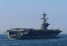 Navy Letter Sparks Capitol Uproar Aircraft carrier cruising at sea