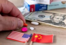 Counterfeit Ozempic Pipeline Exposed Hand picking an orange pill beside US and China flags and cash
