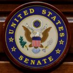 United States Senate seal on a wooden wall