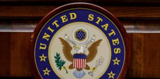 United States Senate seal on a wooden wall