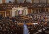 Legislative chamber filled with attendees during a formal address