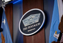 Pentagon Purge: Top General Ousted The Pentagon emblem between two flags.
