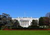 Charity Stage Meltdown Triggers DC Brawl The White House facade with flag and gardens