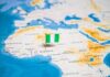 Nigeria Scrambles After Surprise Ebola Confirmation Map of Africa with a pin flag marking Nigeria