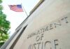Department of Justice building with American flag