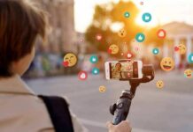 Cash-For-Abortion Claim Engulfs Top Streamer Person livestreaming with smartphone on gimbal outdoors