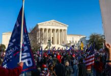 Trump Dangles Payouts – Election Twist Stuns Vets Eugene Sims and Andreas Hestler amid a large crowd outside the U.S. Supreme Court
