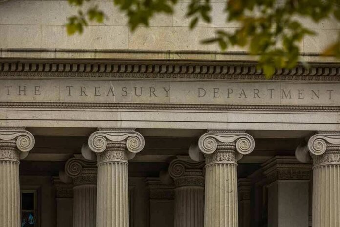 shutterstock_2206423289 Neoclassical building facade with Ionic columns and engraved frieze