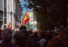 Housing Uprising Ignites Barcelona Streets Crowd with Spanish flags in a city street