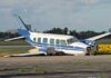 Crop-Dusting Plane Crashes Into Brazilian Daycare Damaged blue and white small airplane on an airport runway