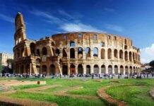 Colosseum Breached Amid Street Chaos The Colosseum in Rome with tourists walking around it
