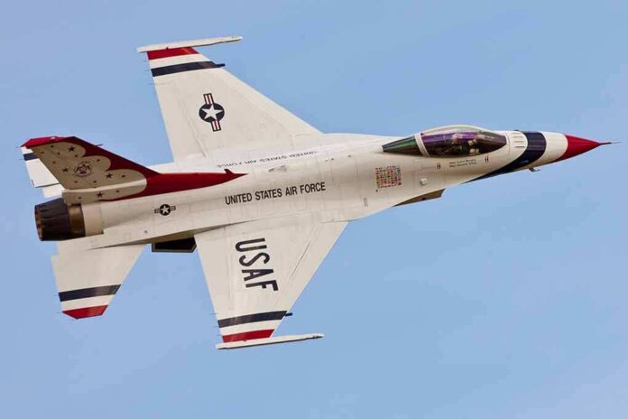 USAF fighter jet in flight against clear sky